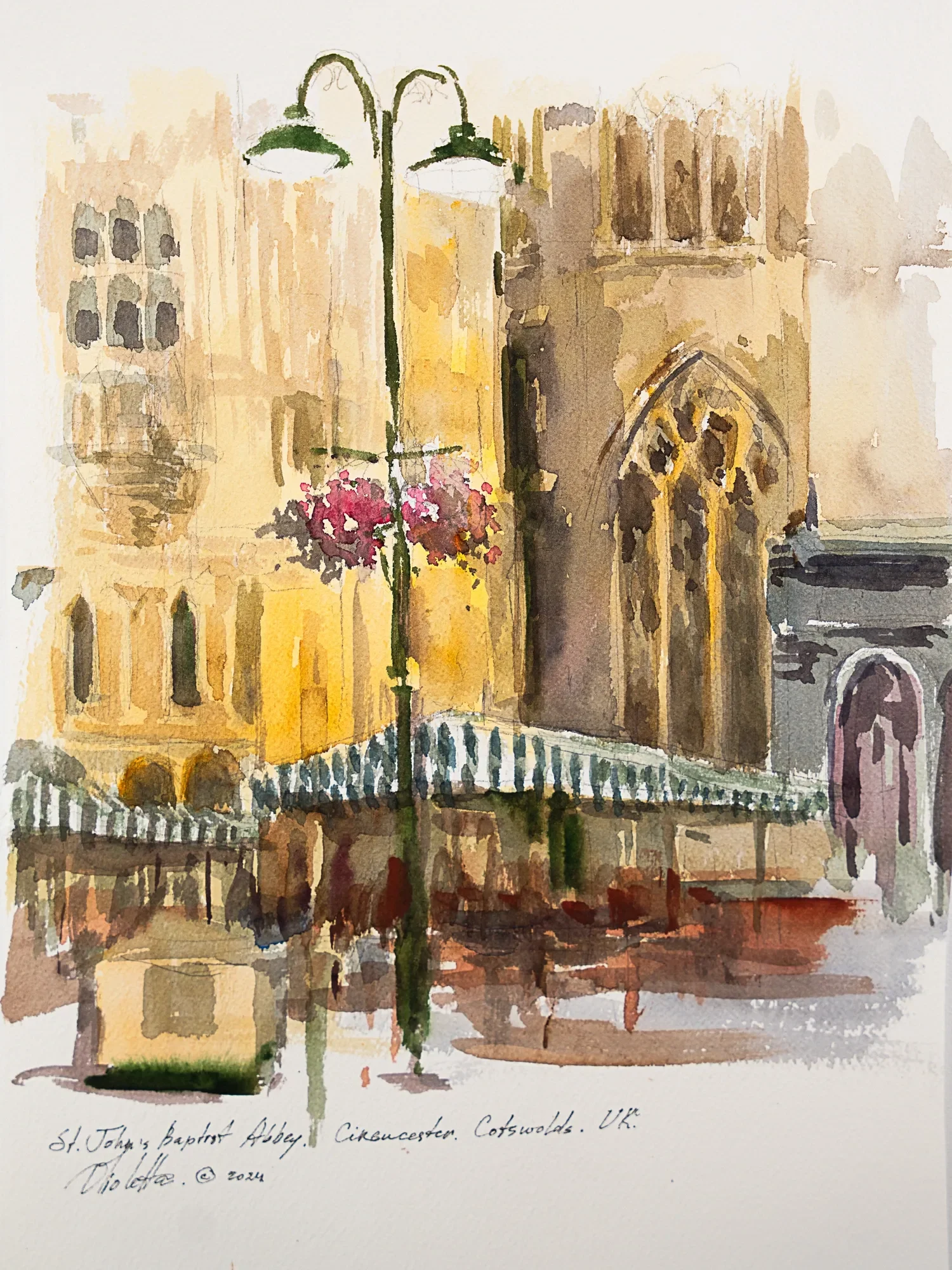 A Gothic church entrance and a streetlamp — study by Violetta Chandler